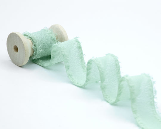 crepe effetto seta sfrangiato 25 mm verde mare