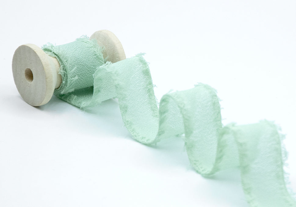 crepe effetto seta sfrangiato 25 mm verde mare