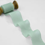 crepe effetto seta sfrangiato 40 mm verde mare